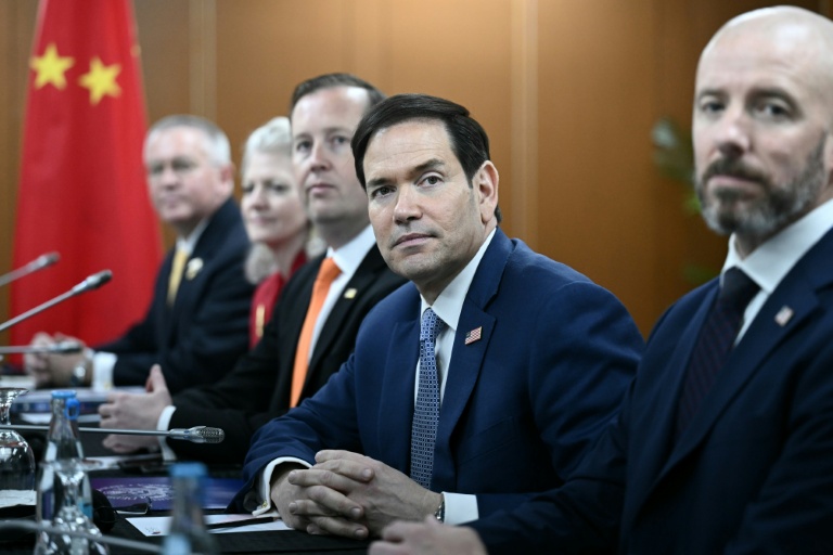 US Secretary of State Marco Rubio (C) during a meeting with China's Foreign Minister Wang Yi in Manila