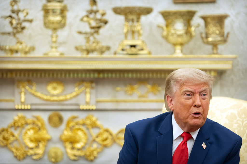 Trump says US will destroy a bridge or power plant for each Iranian attack in the Strait of Hormuz