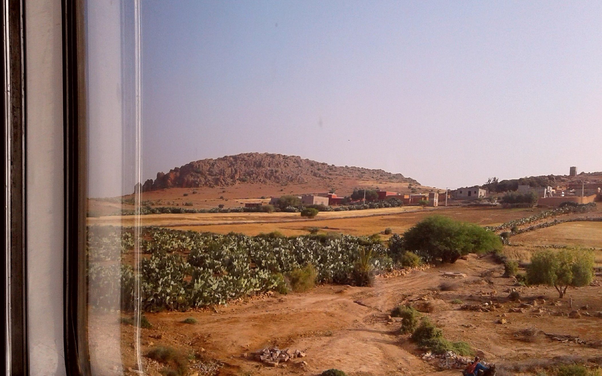 A view of Morocco's arable landscape from a train window travelling to Casablanca