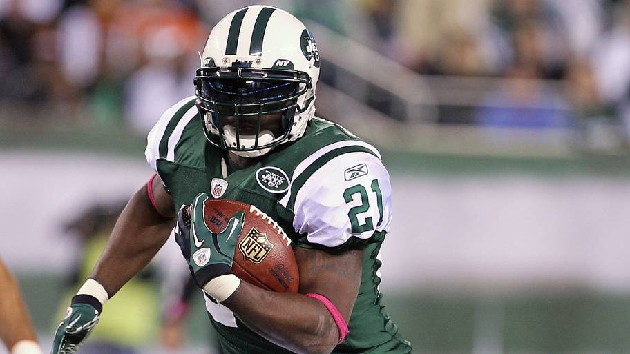 LaDainian Tomlinson (21) runs with the ball.