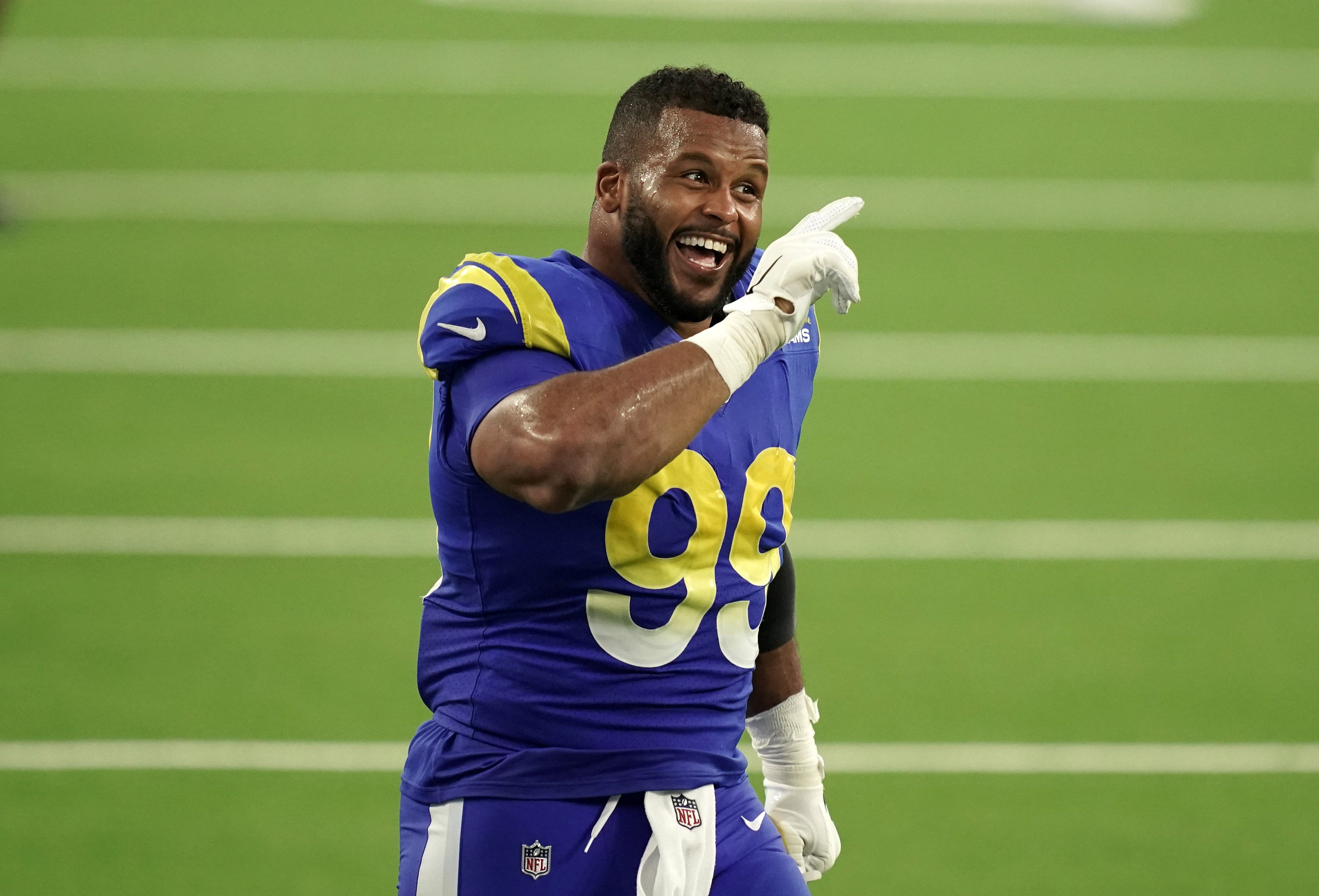 Aug 22, 2020; Inglewood California, USA; Los Angeles Rams defensive lineman Aaron Donald (99) celebrates during a scrimmage at SoFi Stadium. Mandatory Credit: Kirby Lee-USA TODAY Sports
