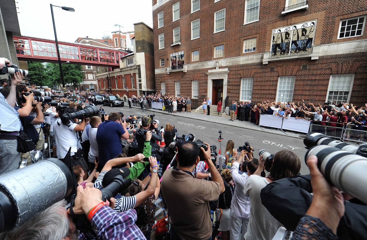 The media photographing Prince William, Kate Middleton, and Prince George at the Lindo Wing.