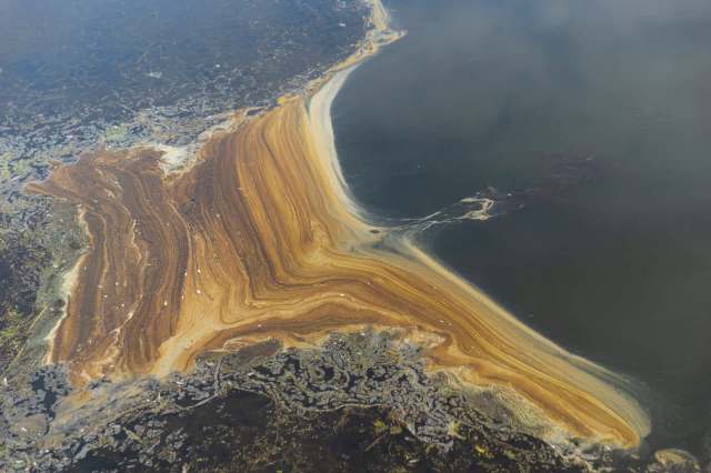 Sanctioned tanker hauling Russian fuel is likely leaking oil in protected waters off Oman