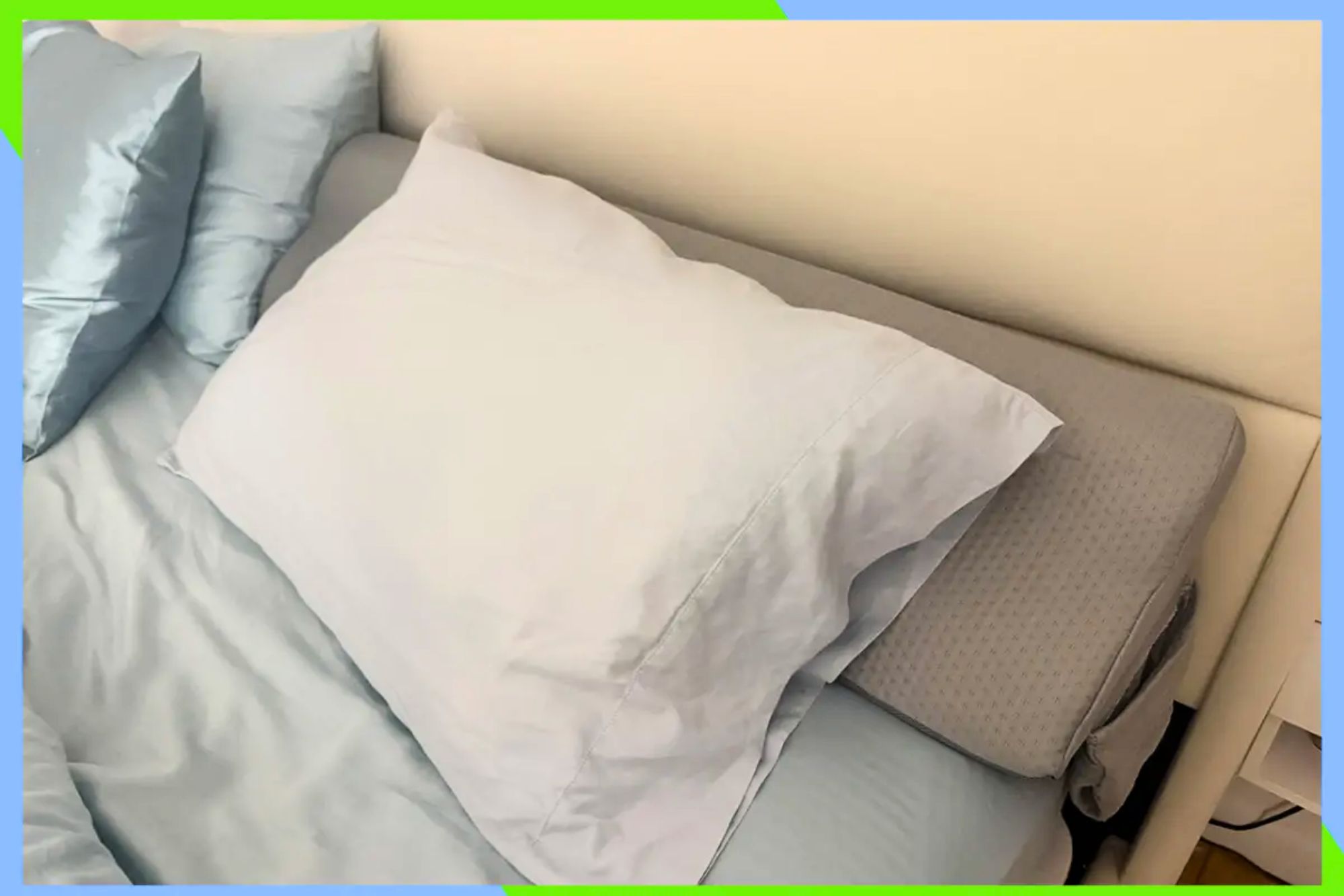 This plush pillow stops my essentials from disappearing in the cracks of my bed