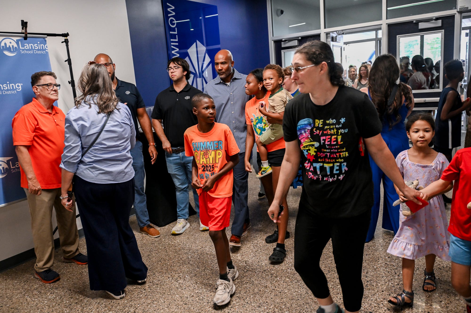 Guests tour the new Willow School on Tuesday, July 21, 2026, in Lansing.