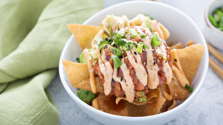 Poke bowl nachos style with fried wonton wrappers