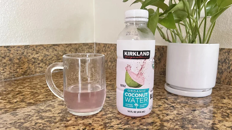 Kirkland Signature Organic Coconut Water on a marble countertop