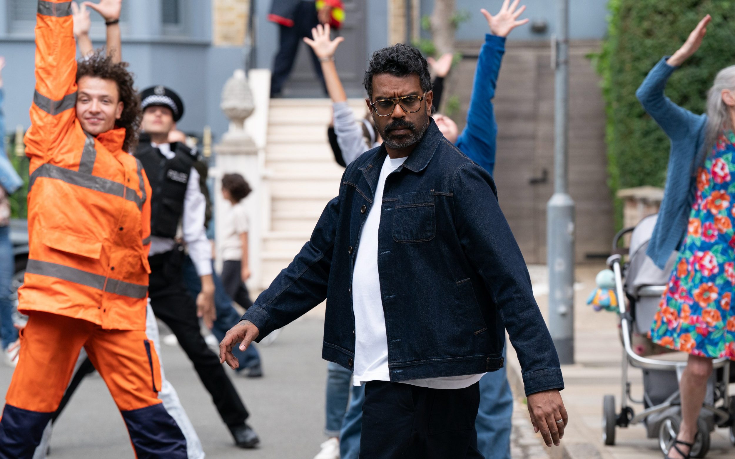 Romesh Ranganathan in a scene from the BBC's new all-singing, all-dancing advert