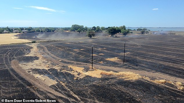 More than 50 firefighters battled the blaze on Manor Farm in Hayling Island, Hampshire, which erupted at midday on Monday