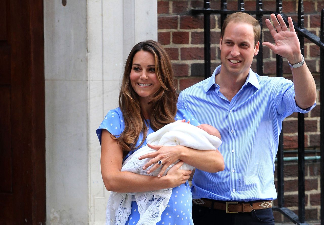 The new family of three outside the Lindo Wing on July 23, 2013.