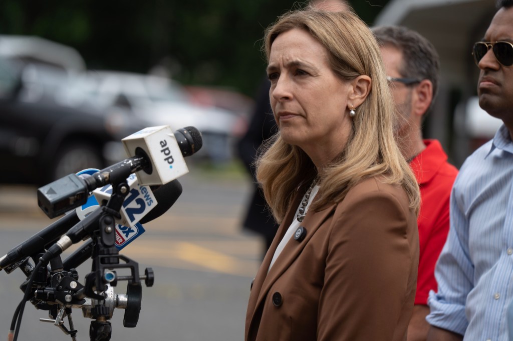 New Jersey Governor Mikie Sherrill meets with Ocean Township Mayor John P. Napolitani before a press conference at BJ's