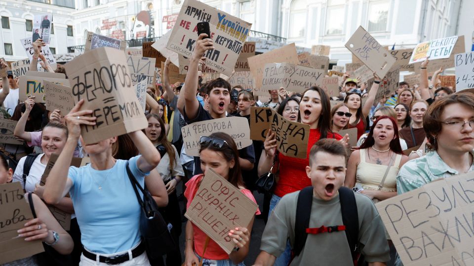 People protest against Zelensky's decision to replace Mykhailo Fedorov as defense minister in Kyiv on July 17. - Thomas Peter/Reuters