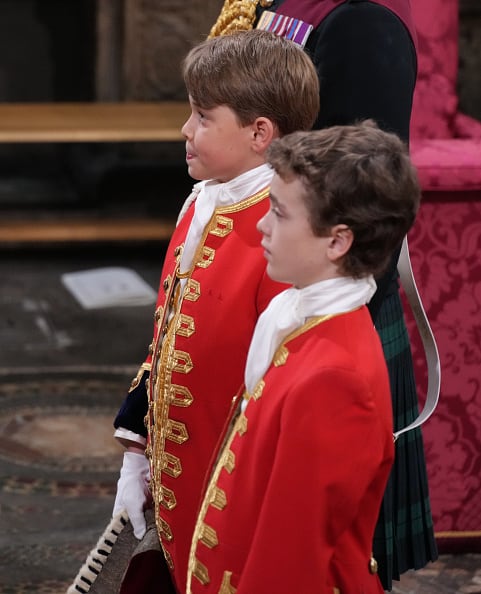 2023: Prince George as Page of Honour during the coronation ceremony of King Charles III and Queen Camilla in Westminster Abbey, on May 6, 2023 in London, England. The Coronation of Charles III and his wife, Camilla, as King and Queen of the United Kingdom of Great Britain and Northern Ireland, and the other Commonwealth realms takes place at Westminster Abbey today. Charles acceded to the throne on 8 September 2022, upon the death of his mother, Elizabeth II. (Photo by Victoria Jones - WPA Pool/Getty Images)