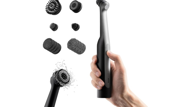 Stock photo of a cordless scrubber wand with attachments