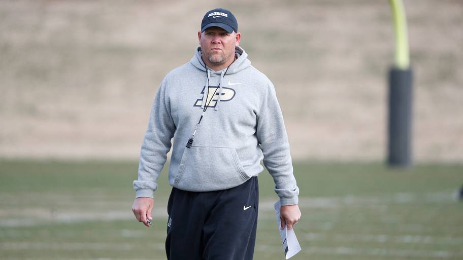 Purdue Boilermakers head coach Barry Odom looks down the field.