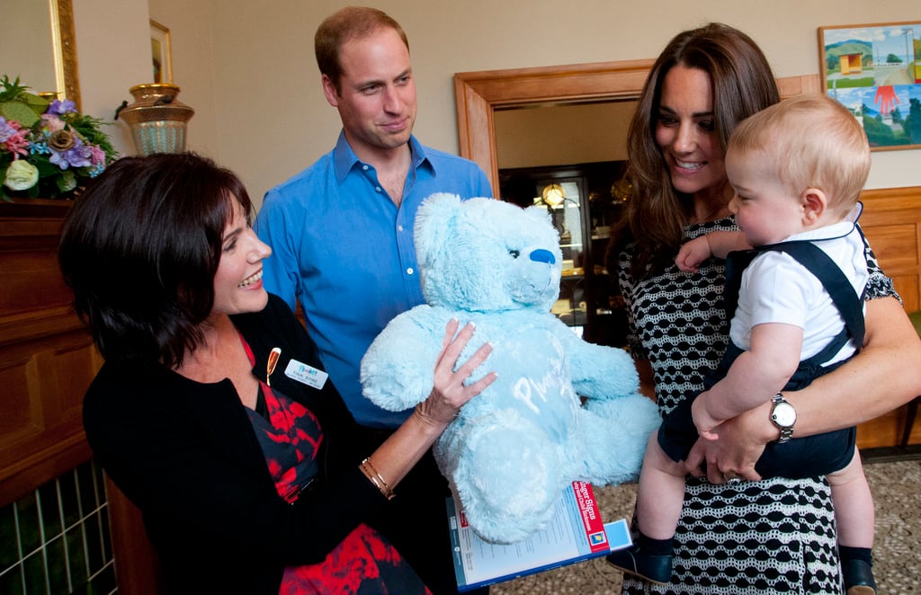 2014: In this handout photo provided by Government House NZ, Prince William, Duke of Cambridge, Catherine, Duchess of Cambridge and Prince George of Cambridge attend Plunkett's Parent's Group at Government House on April 9, 2014, in Wellington, New Zealand. The Duke and Duchess of Cambridge are on a three-week tour of Australia and New Zealand, the first official trip overseas with their son, Prince George of Cambridge.