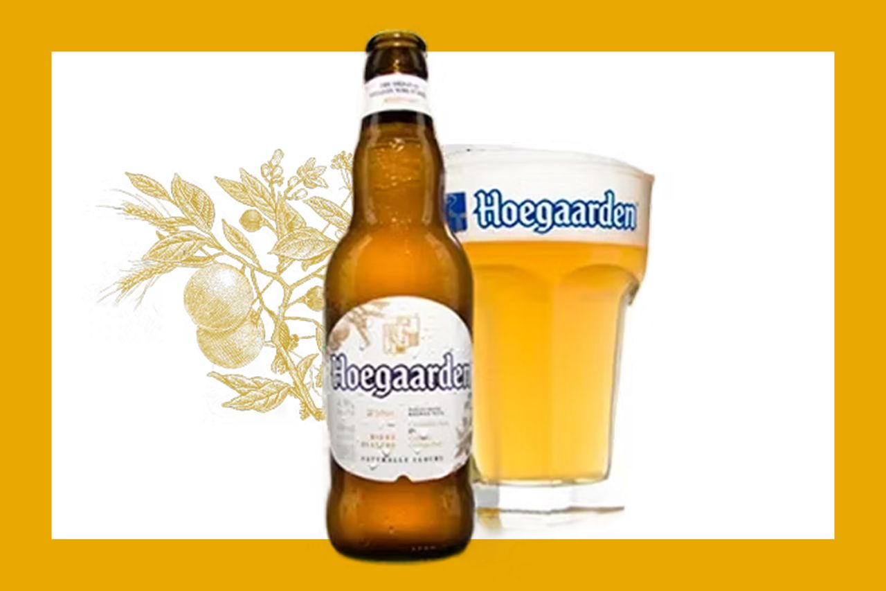 Hoegaarden beer bottle and glass with a decorative botanical design in the background