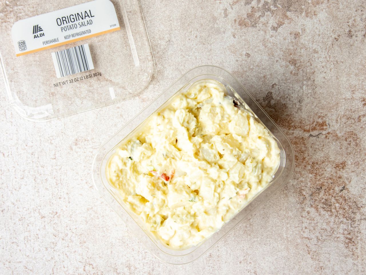 Container of Aldi original potato salad with label visible