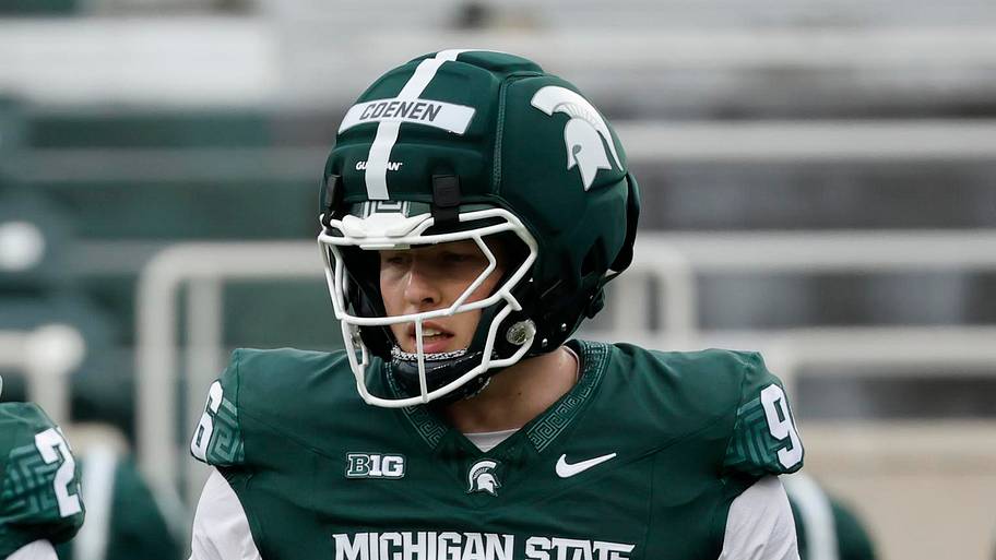 Michigan State Spartans linebacker Kenny Soares Jr. (23) and defensive lineman Eli Coenen (96)