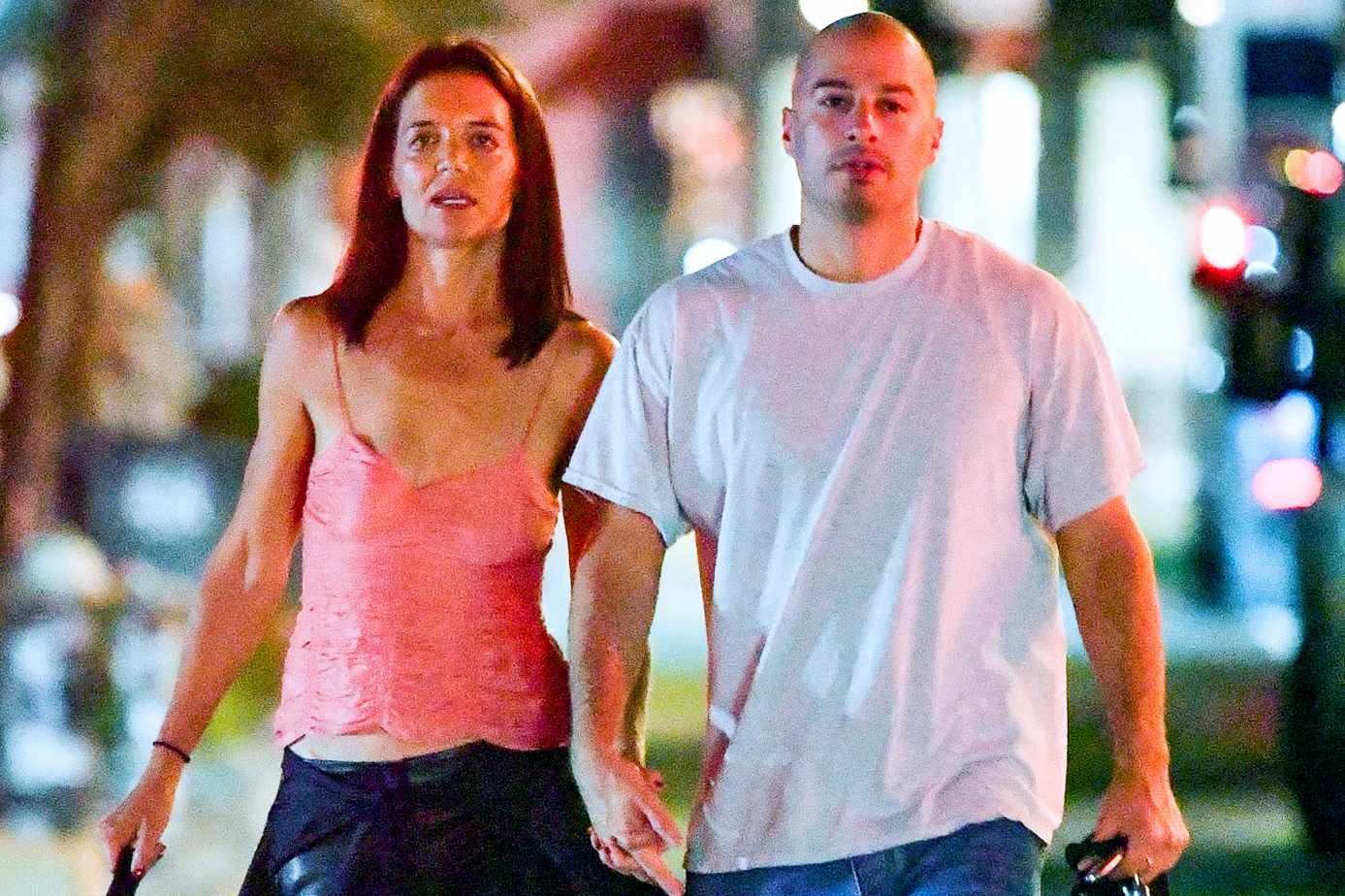 Katie Holmes cozies up and shares a kiss with new beau Jason Bard Yarmosky at star-studded private concert