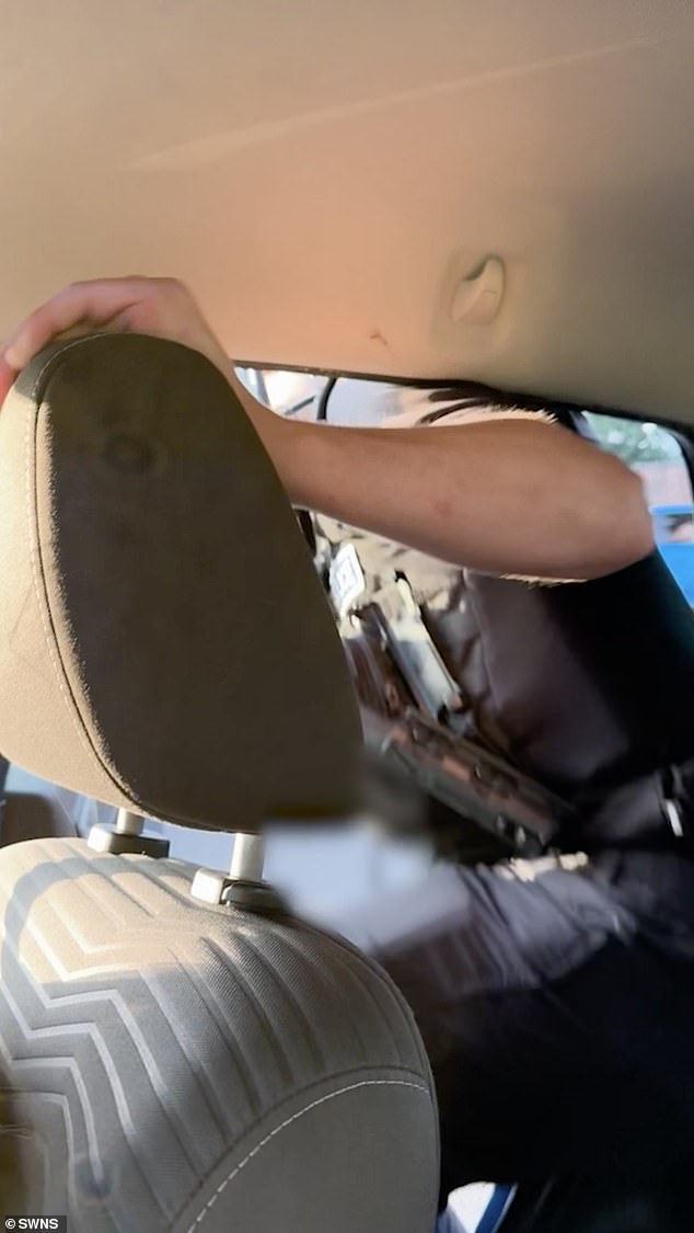 The policeman then clambours into the back seat. He then opens the door and tells the driver to 'stop here' before jumping out of the car and resuming the chase on foot