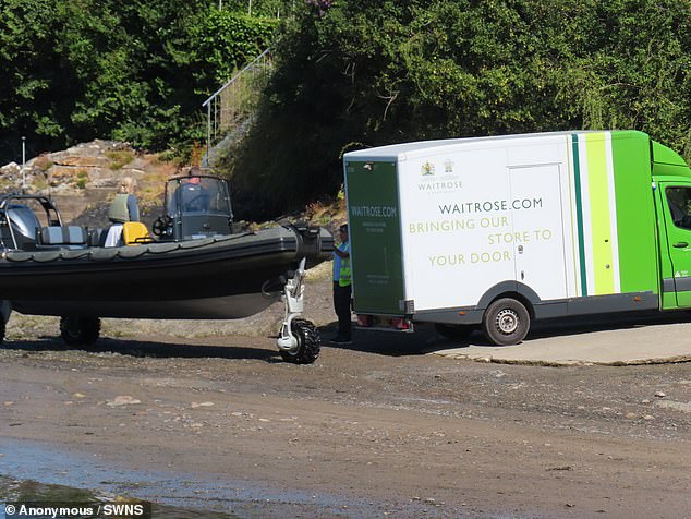 The adventurer, 52, was spotted collecting up his weekly shop on a custom-made boat opposite his private Welsh island, Saint Tudwal's Island West, last week on the Llŷn Peninsula