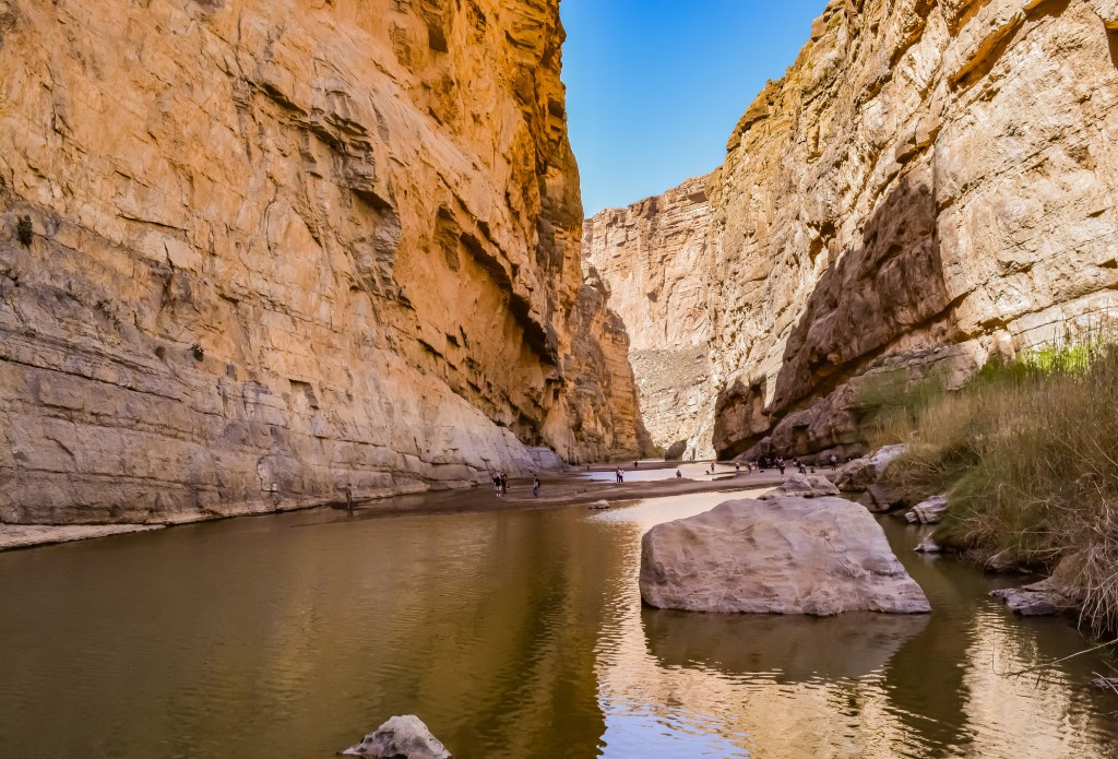 A view of towering rock cliffs at Santa Elena Canyon in Big Bend National Park.