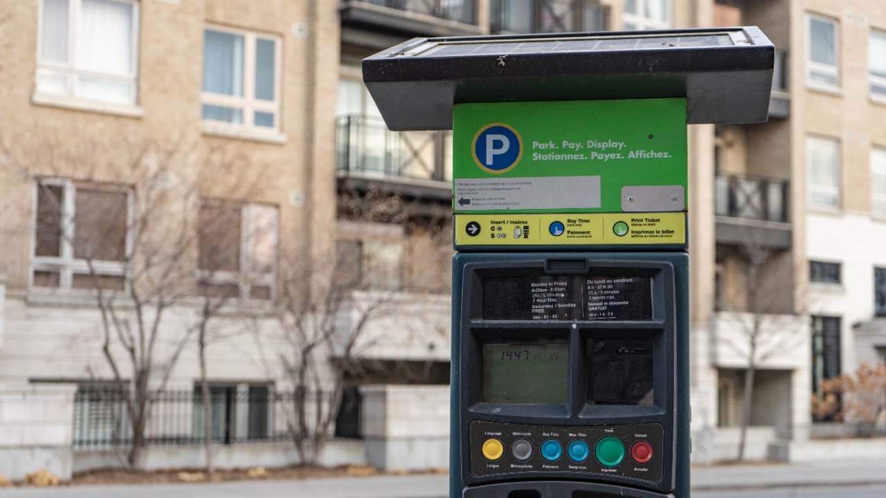 Scammers are pasting fake QR codes over parking meters to hijack your phone and wallet