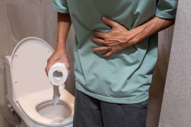 Constipation and diarrhea in bathroom. Hurt man touch belly stomach ache painful. colon inflammation problem, toxic food, abdominal pain, abdomen, constipated in toilet, stomachache, Hygiene