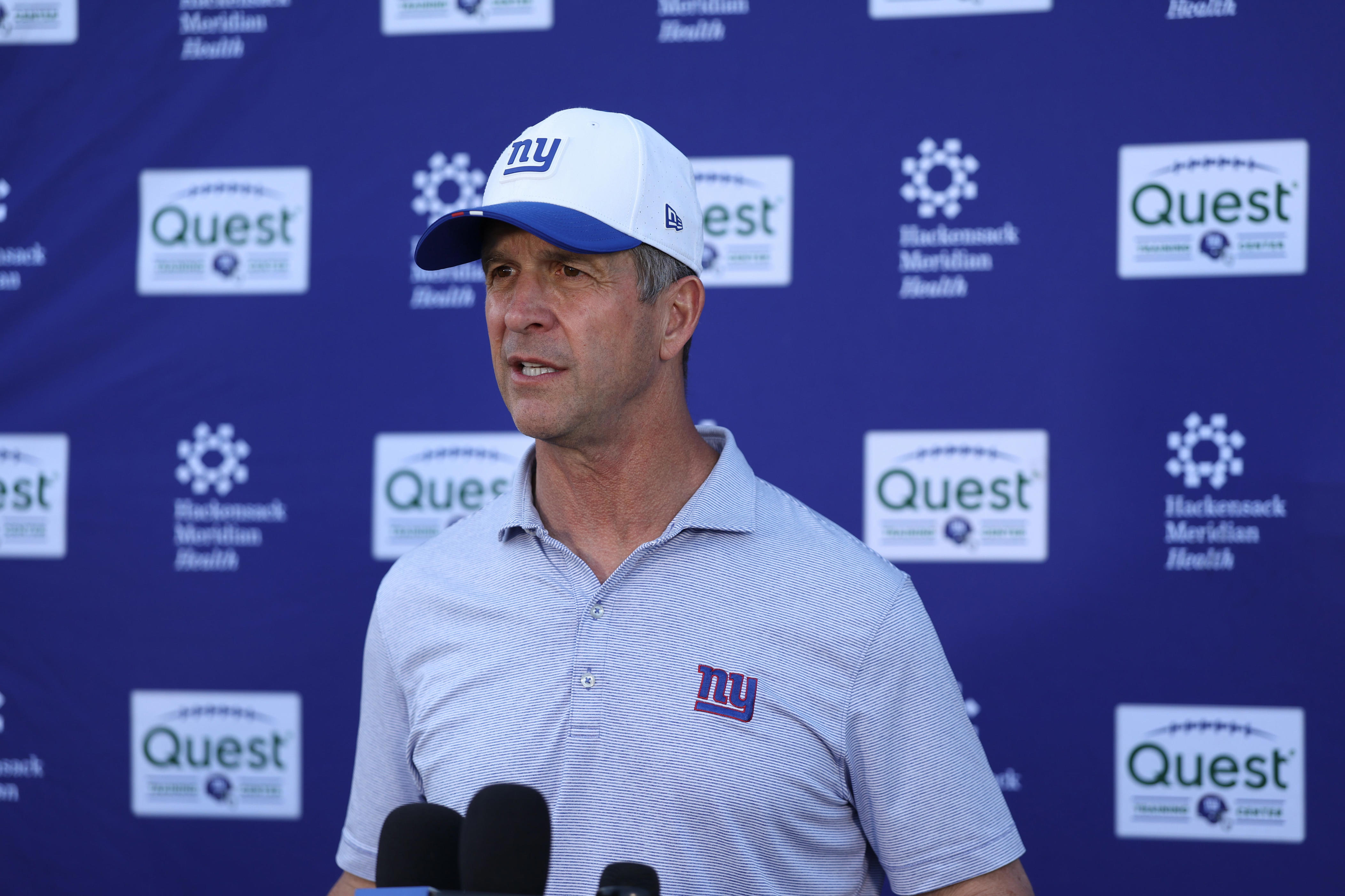 Jun 9, 2026; East Rutherford, NJ, USA; New York Giants head coach John Harbaugh answers questions from the press after the minicamp activities at Quest Diagnostics Center.