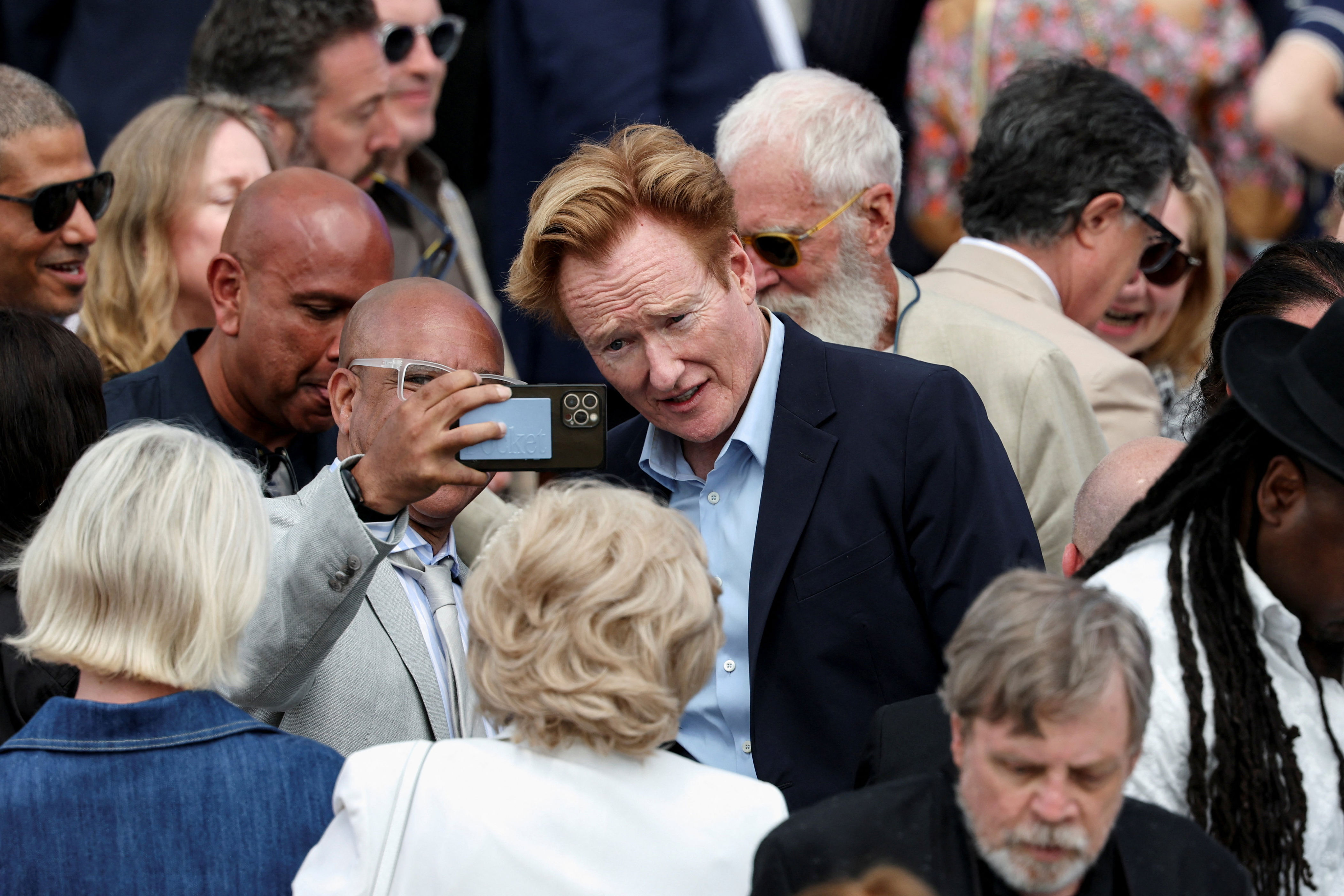 Conan O'Brien poses for a picture during the dedication ceremony for the opening of the Obama Presidential Center in Chicago.
