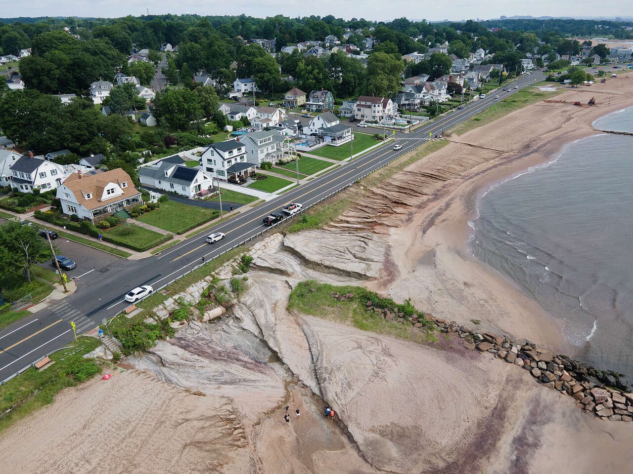 Floodwaters carved 5-foot canyons through West Haven beaches, official says