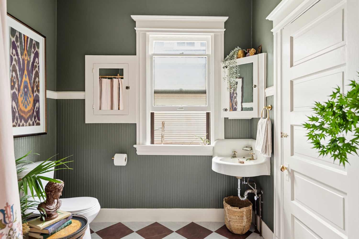I used a wine rack for bathroom storage, and it's so smart