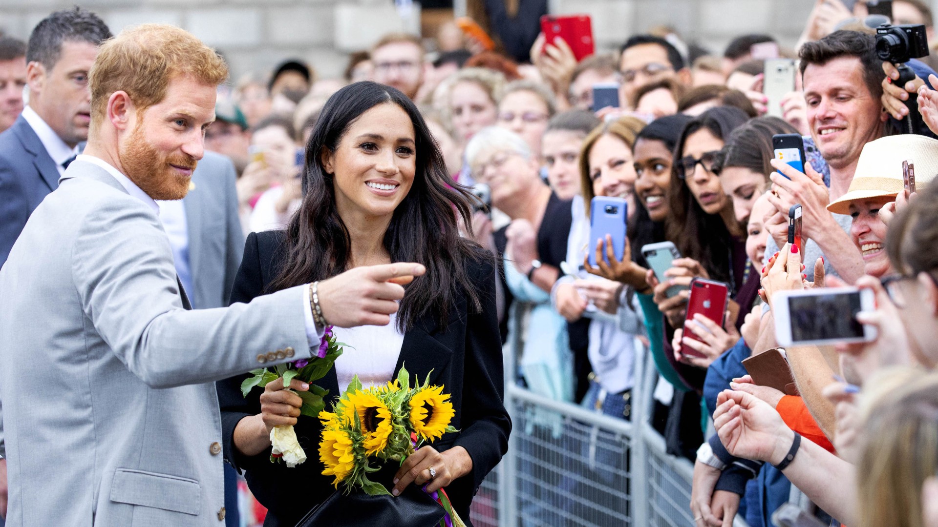 Meghan Markle is ‘fully behind’ spending more time in the U.K. due to her ‘outcast status’ in the U.S., a source close to Prince Harry says