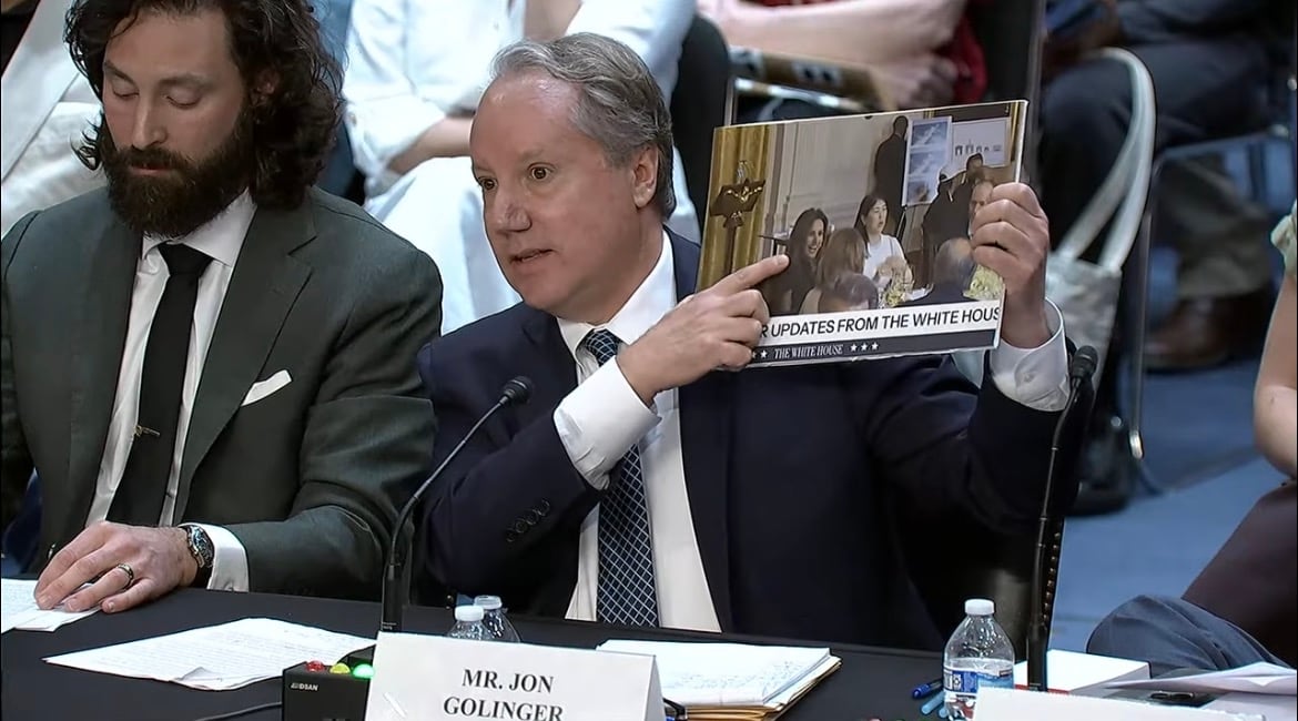 Public Citizen democracy advocate Jon Golinger, testifying at Capitol Hill, holds up a photo of Meredith O'Rourke attending a ballroom donor dinner at the White House last year. / House Oversight Democrats
