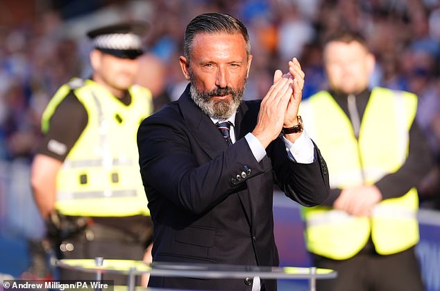 Derek McInnes applauds the fans before kick-off and was well received by the Ibrox support