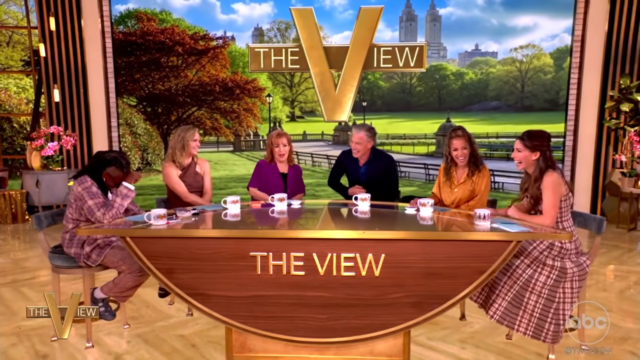 ‘The View’ star Joy Behar pulls married guest in for a kiss on the lips