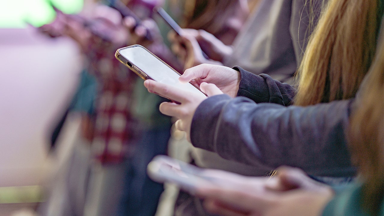 People holding cellphones