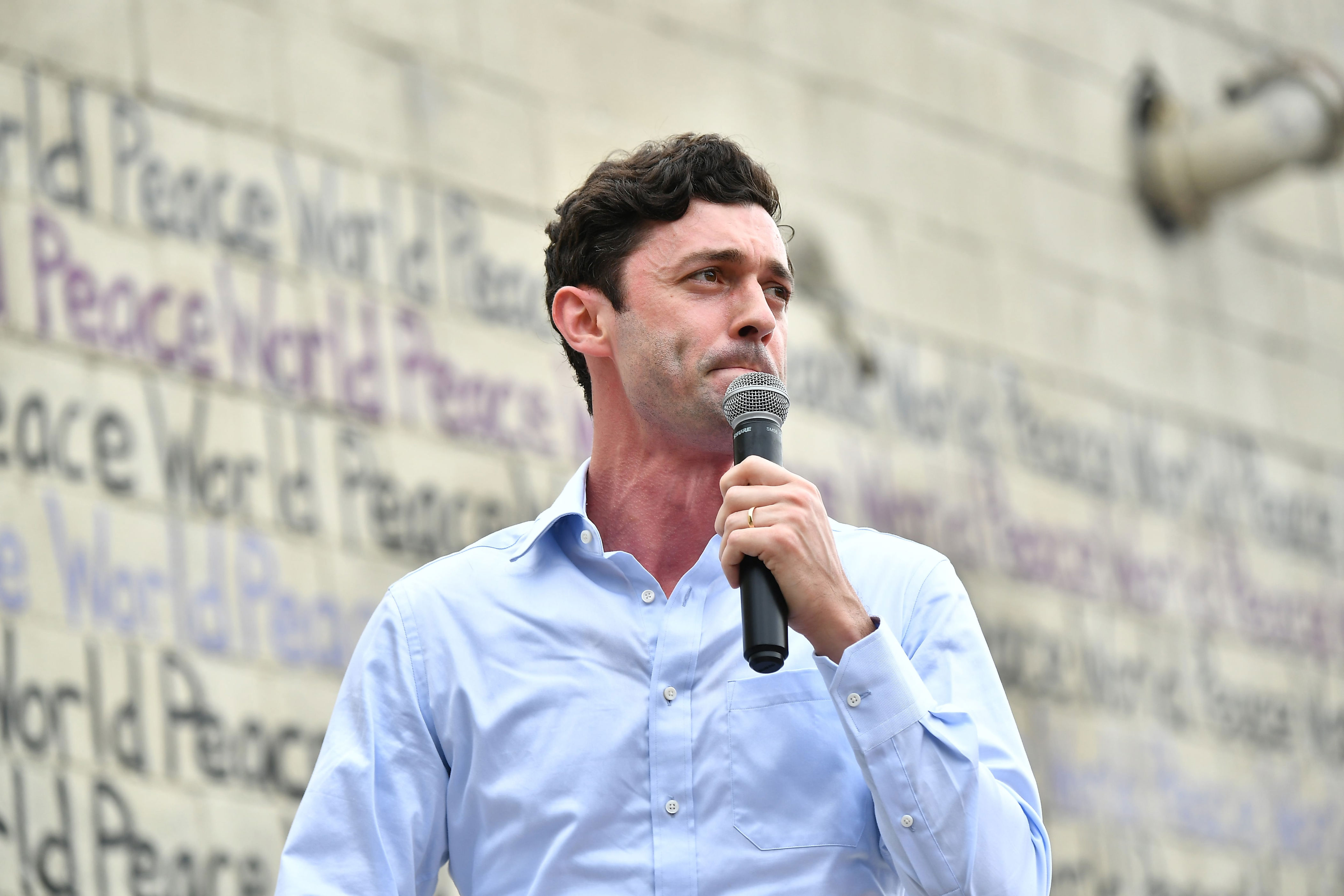 Sen. Jon Ossoff is impressing voters with his ability to go after Republicans, including President Donald Trump. / Paras Griffin / Getty Images,