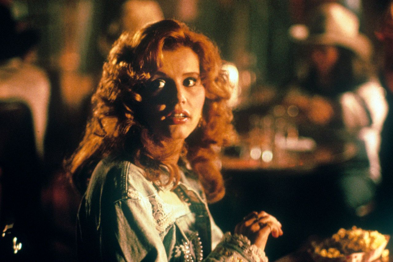 American actress and model Geena Davis (Virginia Elizabeth Davis) sitting at a table in the film Thelma&Louise. USA, 1991