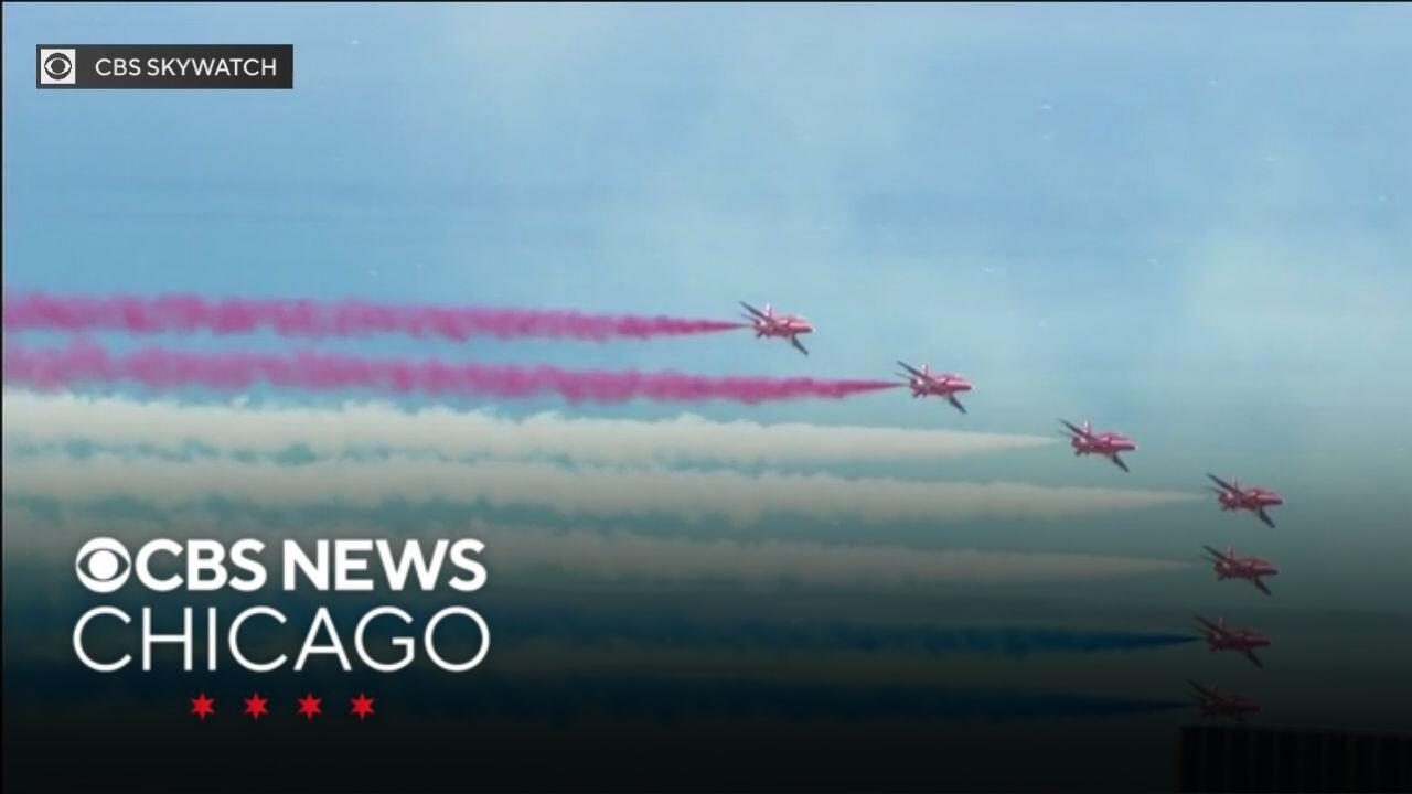 Britain’s Red Arrows aerobatic team fly over Chicago's Loop