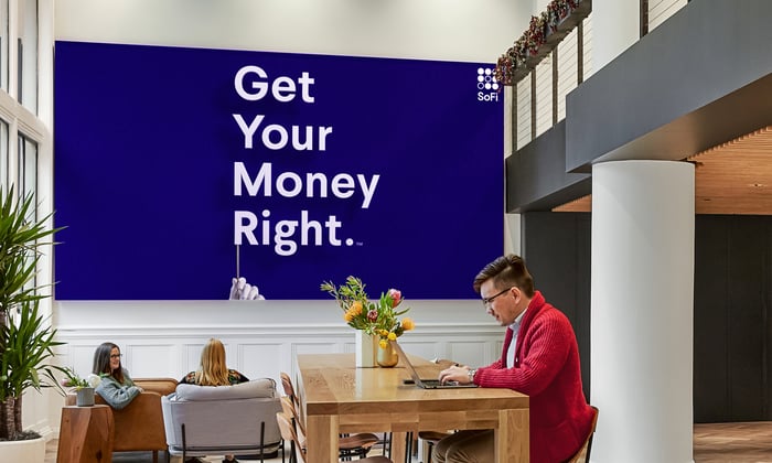 SoFi office with sign on wall saying "Get Your Money Right."