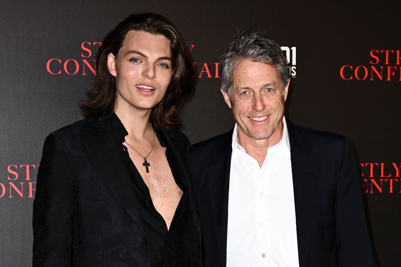 Damian Hurley and Hugh Grant posing together at an event