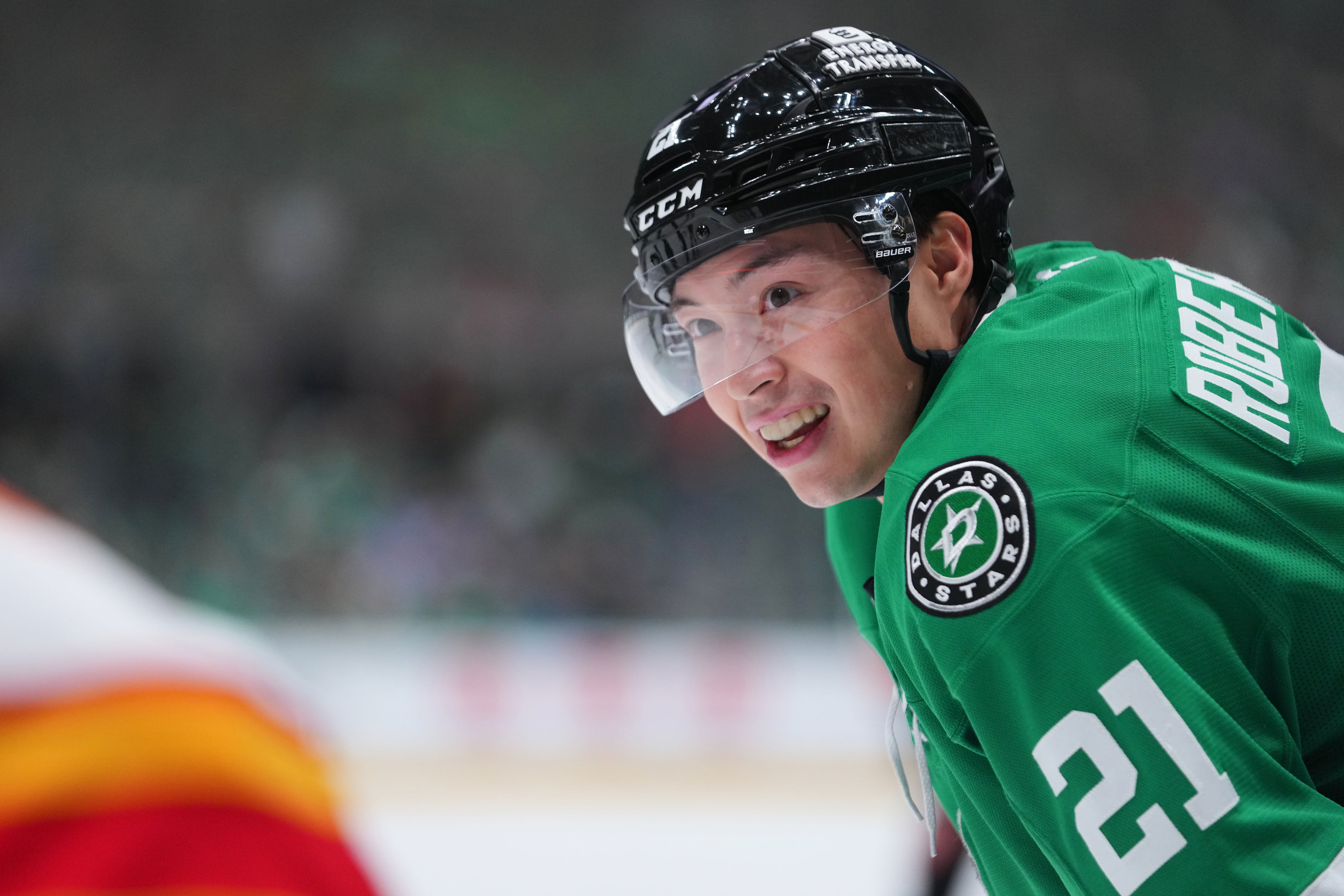FILE - Dallas Stars left wing Jason Robertson looks on before play resumes against the Calgary Flames during the first period of an NHL hockey game, April 7, 2026, in Dallas. (AP Photo/Julio Cortez, File)