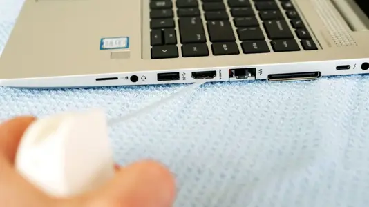Canned air can clear out dust inside your PC's ports