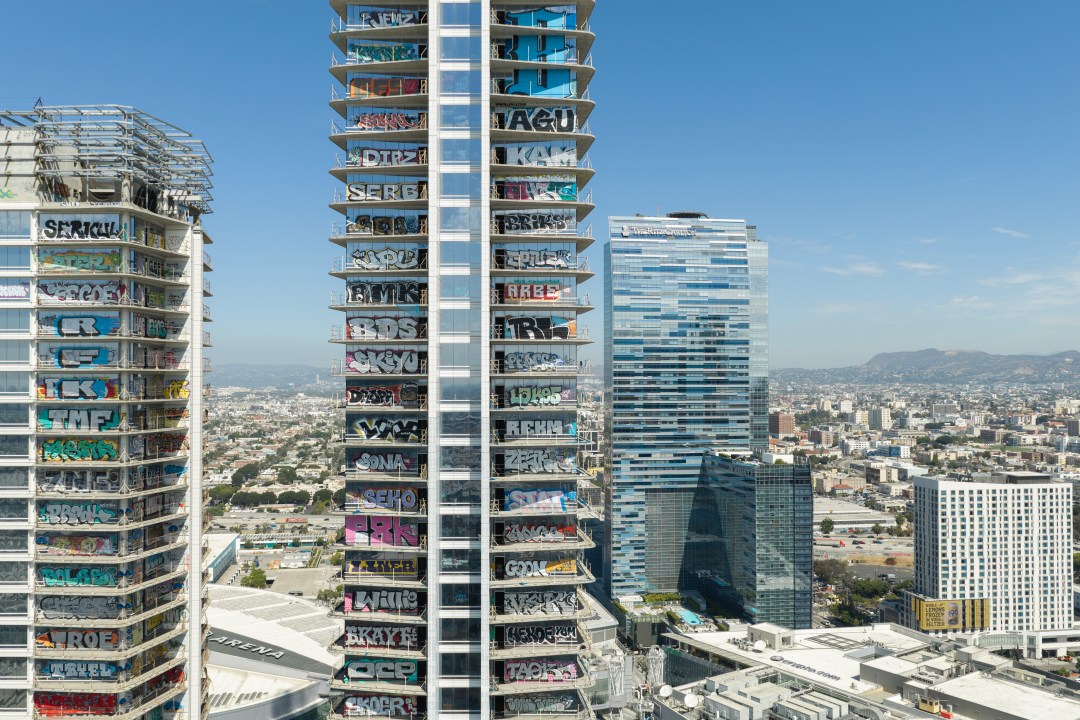 Oceanwide Plaza graffiti towers against DTLA skyline