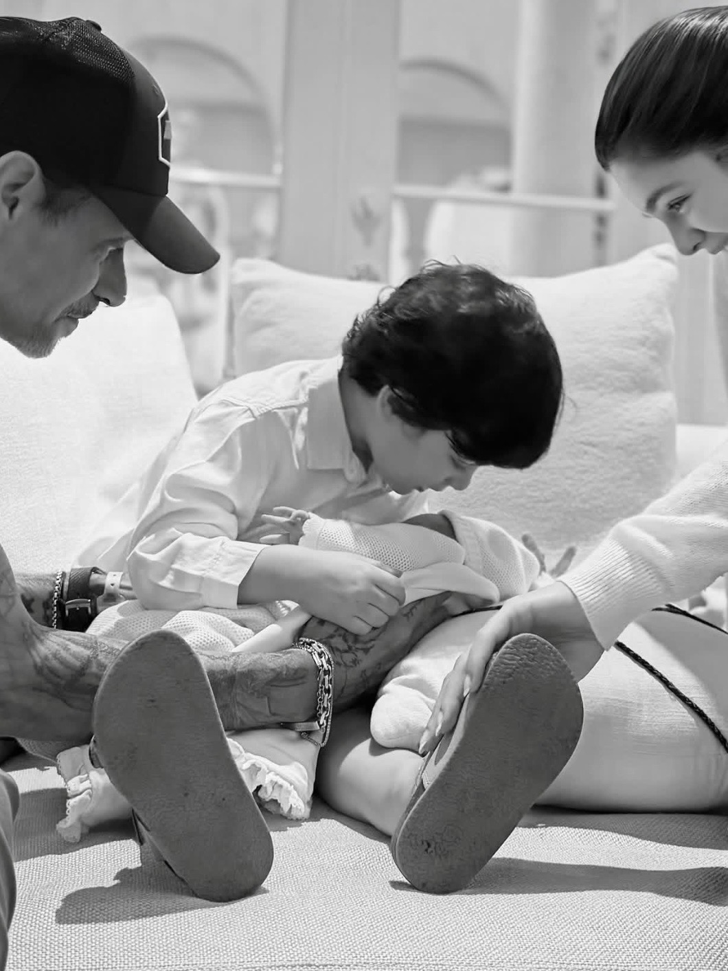 Marc Anthony with his wife and two of his kids