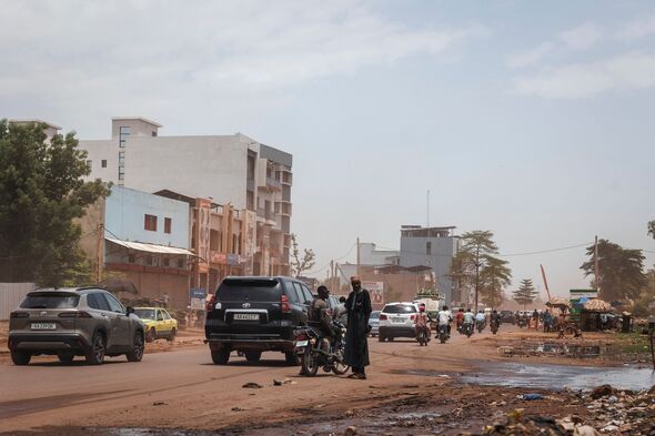 A general view shows traffic moving along a main road in Bamako on July 4, 2026