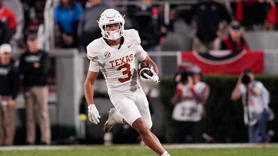 Texas Longhorns wide receiver Emmett Mosley V runs the ball.