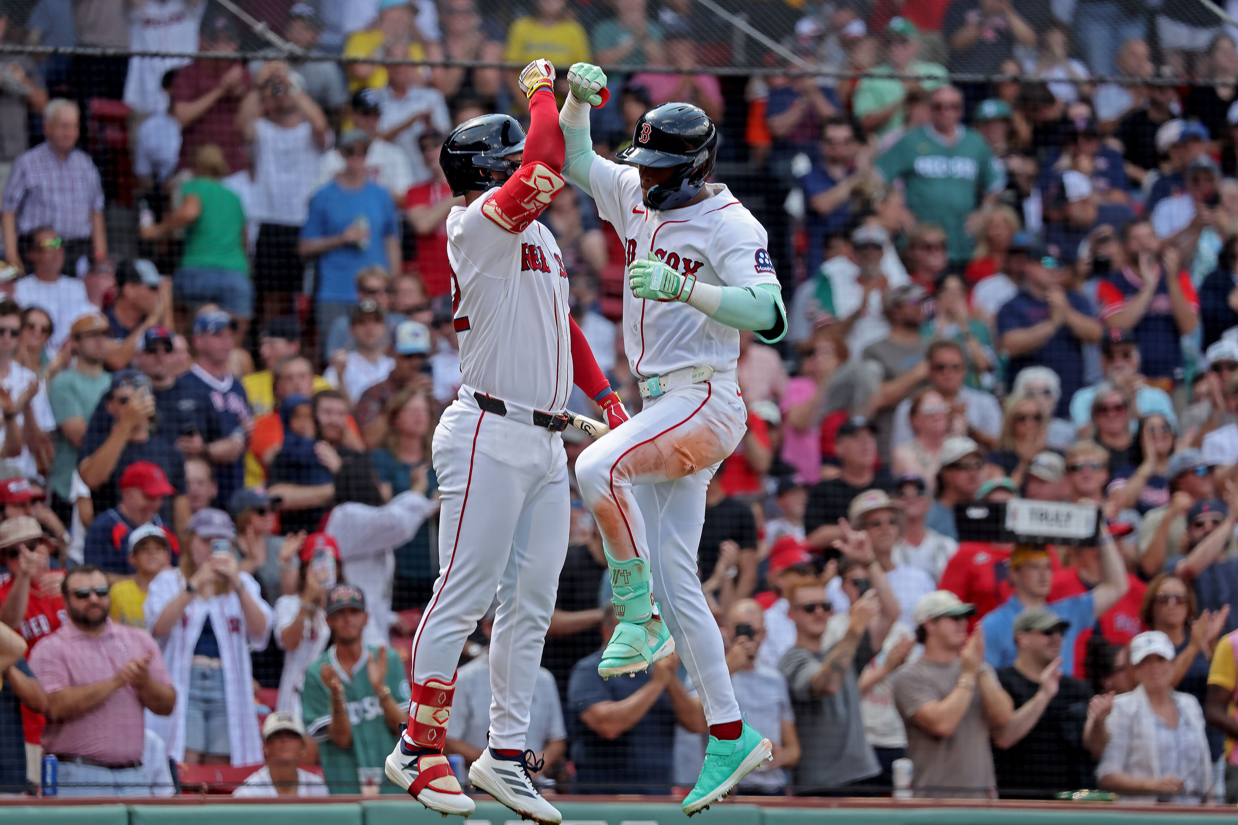 Boston Red Sox center fielder Ceddanne Rafaela (3) celebrates is solo HR with Boston Red Sox right fielder Wilyer Abreu (52) in the 4th as the Sox take on the Orioles.